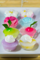 Colorful sweetness thai dessert put on plate on mat background