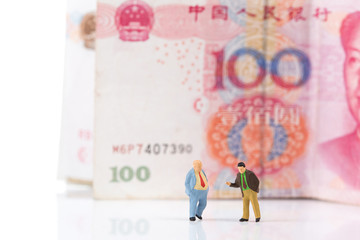 Financial deal concept,businessmen with Chinese money banknotes