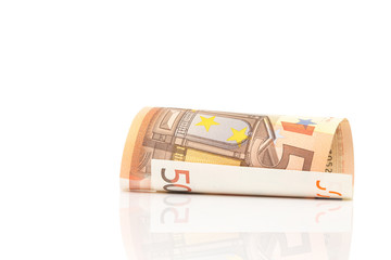 Roll of 50 Euro paper bills isolated on white with clipping path