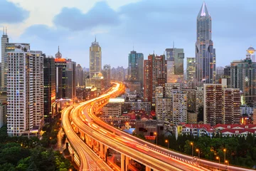 Tuinposter shanghai elevated road junction and interchange overpass at nigh © snvv