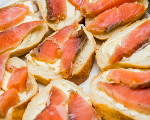 Sandwiches with butter and red fish