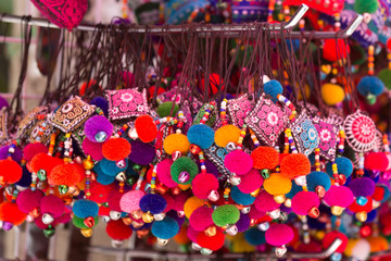 Colorful yarn keychain in lanna style in market