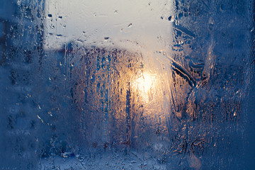 Ice patterns on winter glass.