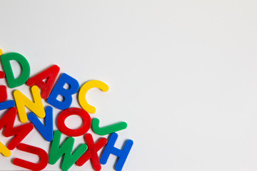 Magnet plastic alphabet on whiteboard