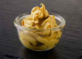 Mustard sauce in  glass bowl