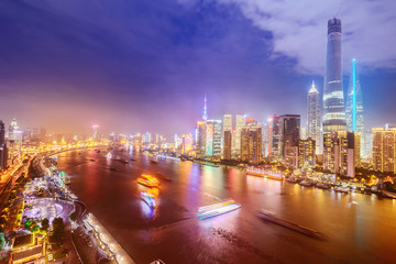 night shanghai skyline with reflection ,beautiful modern city