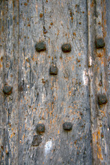 Ancient door with rusty nails