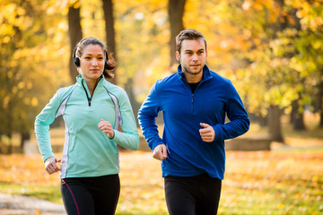 Friends jogging together