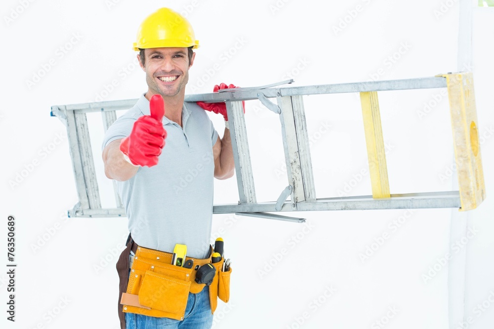 Poster worker carrying step ladder while showing thumbs up