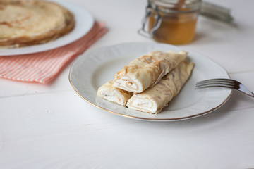 breakfast with pancakes and honey