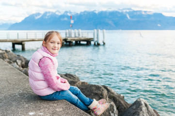 Fototapeta na wymiar Outdoor portrait of adorable little girl