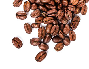 Brown coffee beans isolated on white background macro. Roasted C