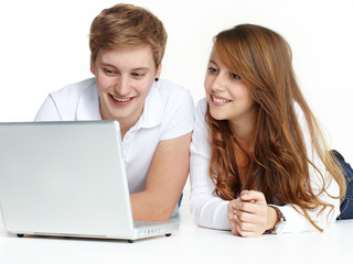 Happy couple with laptop