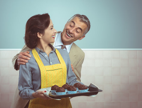 Vintage Woman Cooking Muffins For Her Husband