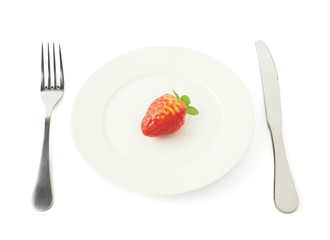 Strawberry fruit in a plate isolated