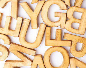 Surface covered with multiple wooden letters