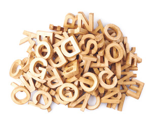 Pile of wooden block letters isolated