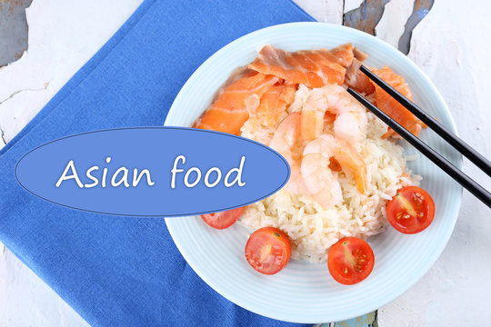 Boiled rice with shrimps and salmon