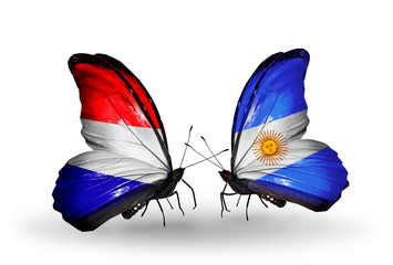 Two butterflies with flags Holland and Argentina