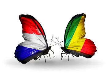 Two butterflies with flags Holland and Kongo