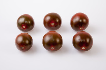 Dark green cherry tomatoes