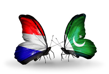 Two butterflies with flags Holland and Pakistan