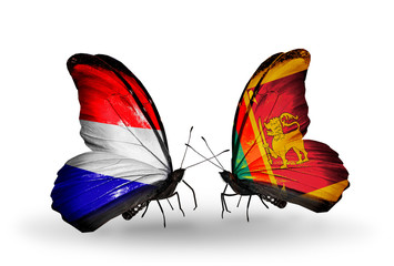 Two butterflies with flags Holland and Sri Lanka
