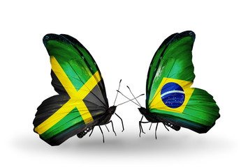 Fototapeta na wymiar Two butterflies with flags Jamaica and Brazil