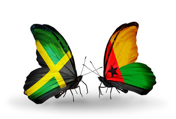 Two butterflies with flags Jamaica and Guinea Bissau