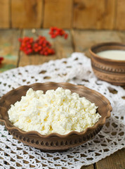 Cottage Cheese and milk in a clay pot