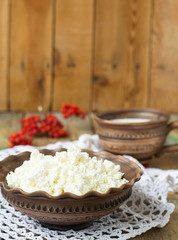 Cottage Cheese and milk in a clay pot