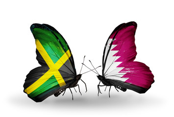 Two butterflies with flags Jamaica and Qatar