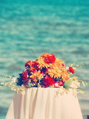Wedding ceremony on the beach vintage color tone