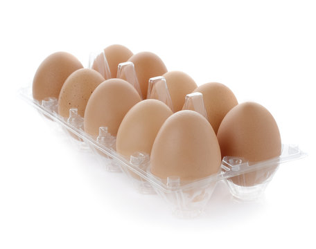 Organic egg in a carton isolated on white background