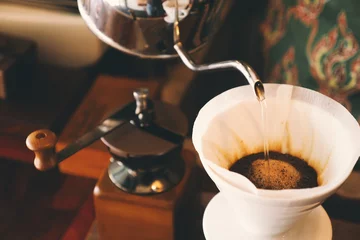 Keuken spatwand met foto vintage kleurtoon: kopje koffie in coffeeshop © chayathon2000