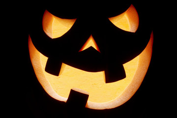 Halloween pumpkin smile on black