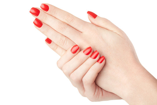 Woman hands with red nail polish on white, clipping path
