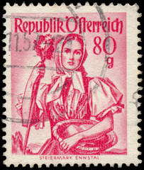 Stamp printed in Austria, shows a woman from Steiermark, Ennstal