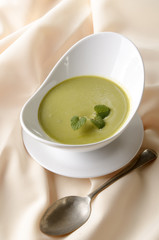 pea and minty soup in a bowl