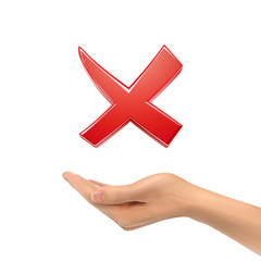 3d hand holding red cross mark