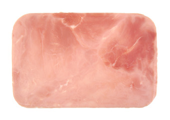 Closeup of one cooked and boiled ham sausage slice isolated on