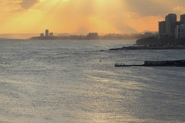 Fototapeta premium Seaside city at sunset. Santo Domingo, Dominican Republic
