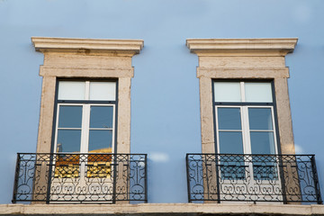 portuguese windows with a balcony
