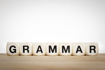 Grammar concept with toy dice