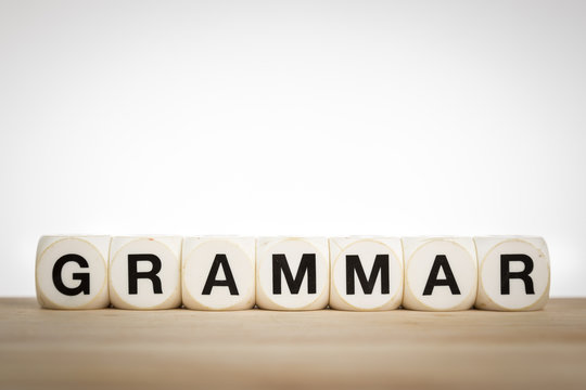 Grammar concept with toy dice