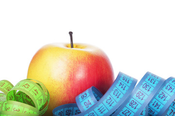 healthy diet concept , apple and a measuring