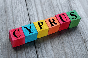 word Cyprus on colorful wooden cubes