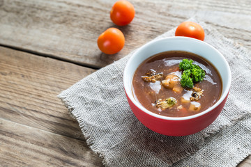Spicy tomato soup with seafood