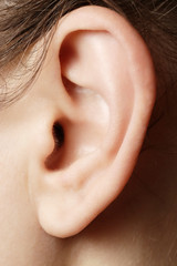 Close up image of a woman's ear