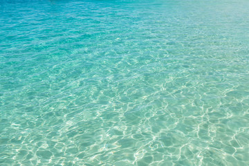 Fototapeta na wymiar Clear turquoise water in Santa Maria beach in Sal Cape Verde